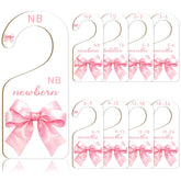 FYSUIMU pink bow dividers for newborn wardrobe organization and easy age sorting.