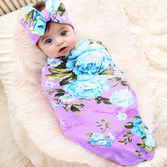 Galabloomer soft-knit swaddle blanket with gentle stretch for snug wrapping.