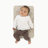 Gathre wipeable baby changing mat shows soft vegan leather surface for easy cleaning