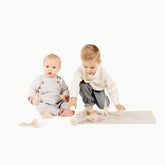 Gathre wipeable baby changing mat with world map design for easy cleaning on the go
