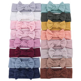Gebelle 16-pcs soft knot headbands in assorted colors for newborns and toddlers.
