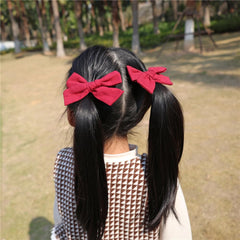Gebelle scarlet classic bow for versatile school or home wear.