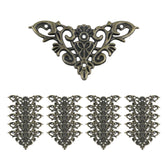 Geesatis antique bronze corner protector closeup showing ornate detailing and sturdy iron build