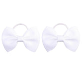 Generic 2inch baby bows in white provide gentle hold for secure all-day hair styling.