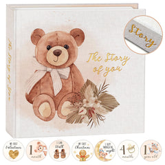 Generic baby memory book inside pages provide organized spaces for milestones and photos