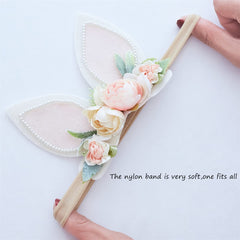 GEZISAN Easter bunny ears headband adds floral accents for adorable photo sessions.