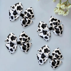 GFLPO pink cow pattern bow closeup, cute accessory for everyday wear