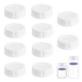 Giftophilia travel lids on Lansinoh bottle cap prevent leaks during trips.