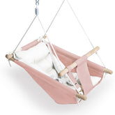 Gladswing canvas baby swing pink seat offers cozy naps and gentle sways.