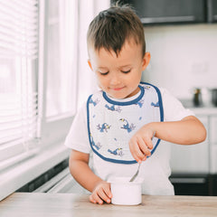 GLLQUEN BABY bib with adjustable two-snap fit grows with baby