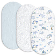 Gllquen Baby muslin bassinet sheets in light blue on bed for breathable comfort.