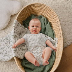 GLLQUEN BABY muslin swaddle blanket with breathable cotton for all-season comfort.