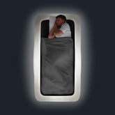 GLOWBED inflatable travel bed with LED remote control for versatile color options
