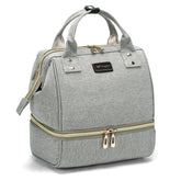 GOGOSO breast pump bag grey exterior with stylish on-the-go design and organized pockets.