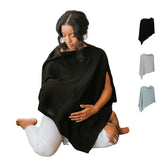Gold Mamas Ponchy nursing cover worn in black provides breathable privacy during feeds.