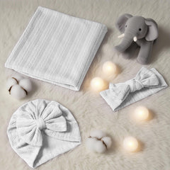 Golener swaddle blanket with textured knit close-up highlighting cozy stretch.