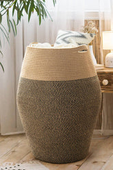Goodpick 105L jute rope laundry hamper full view in a modern bedroom for organized laundry storage.