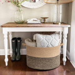 Goodpick 83L wicker basket in living room demonstrates decorative organization