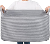 Goodpick large basket with blankets for tidy living room storage.