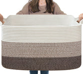 Goodpick large woven storage basket with blankets on a couch for easy living room organization