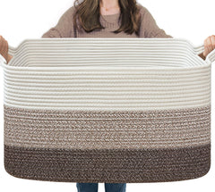Goodpick large woven storage basket with blankets on a couch for easy living room organization