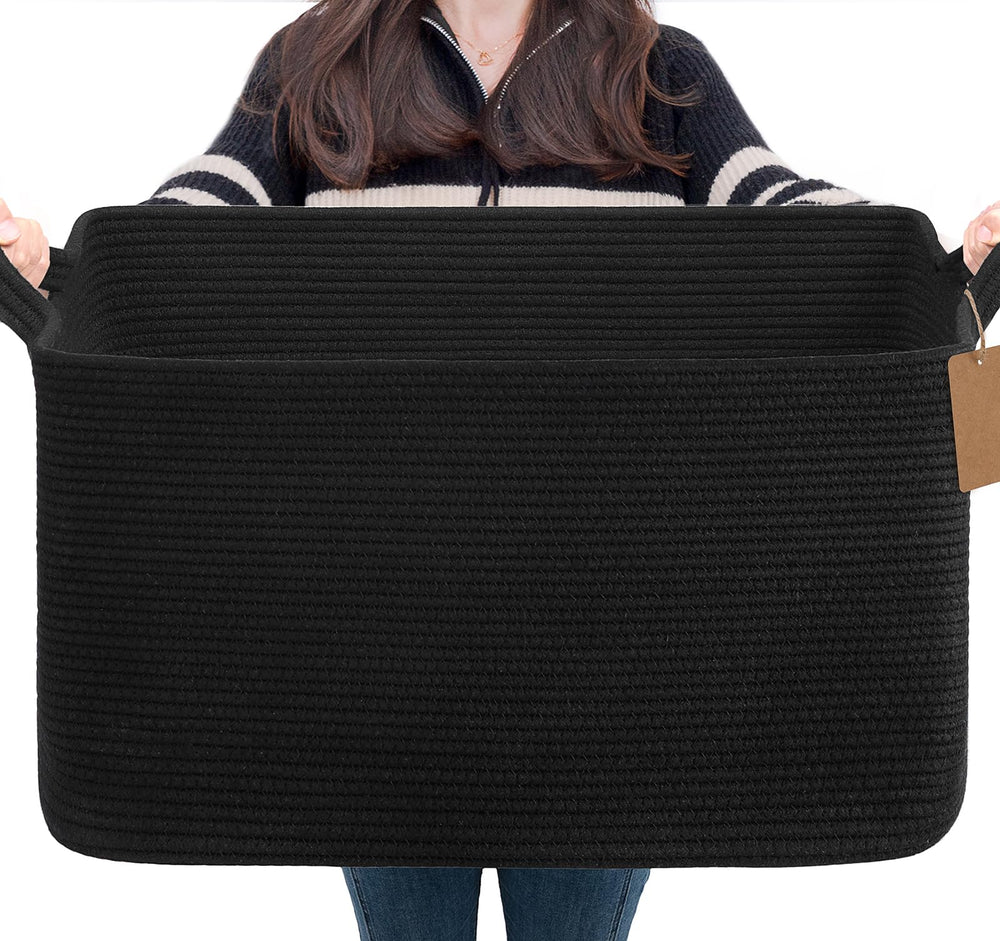 Goodpick woven storage basket in black for living room blanket organization and easy access.