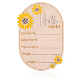 Gosknor baby announcement sign with oval sunflower decor for newborn photos.
