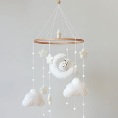 Goukurlsma boho crib mobile with cloud motif for visual focus and calming nursery decor.