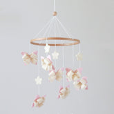 GOUKURLSMA butterfly mobile for crib with seven butterflies and four flowers in a calm nursery scene