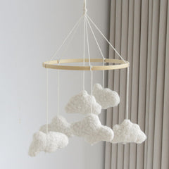 Goukurlsma Cloud Mobile for Crib with cream and wood accents enhances neutral nursery decor.