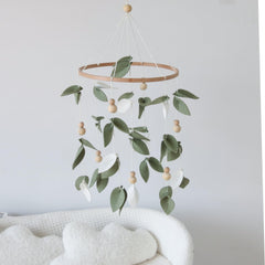 Goukurlsma natural-wood-berries-detail beads provide tactile interest for newborns