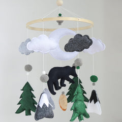 Goukurlsma woodland bear mobile center with moon promotes visual tracking for baby sleep.