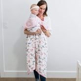GRACED SOFT LUXURIES muslin blanket folded with pastel floral design for gifting