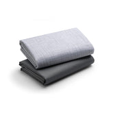 Graco Pack 'n Play waterproof sheets closeup showing soft woven grey fabric for comfy naps