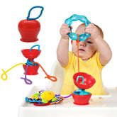 Grapple suction base-table attachment keeps toys within reach during meals.