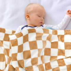 GreatBba plush checkered blanket folded neatly shows compact travel size.