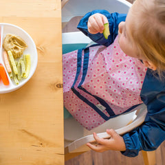 Green Sprouts Easy-Wear Long Sleeve Bib soft-material feels gentle on baby's skin.
