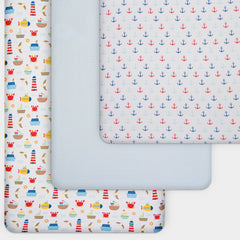 Grow Wild baby boy nursery sheet features anchors and stripes for style.
