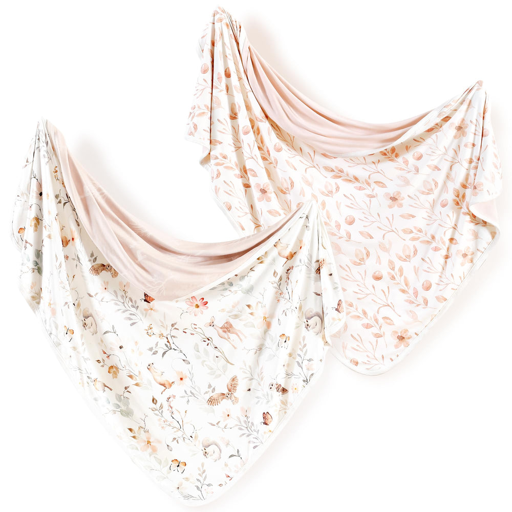 GRSSDER 2-pack swaddle blankets folded, highlighting soft jersey knit for cozy swaddling.