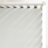 GRSSDER soft muslin crib-sheet texture close-up for gentle skin comfort