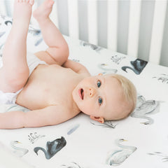 GRSSDER Stretch crib sheet universal fit securely hugs a standard crib mattress.