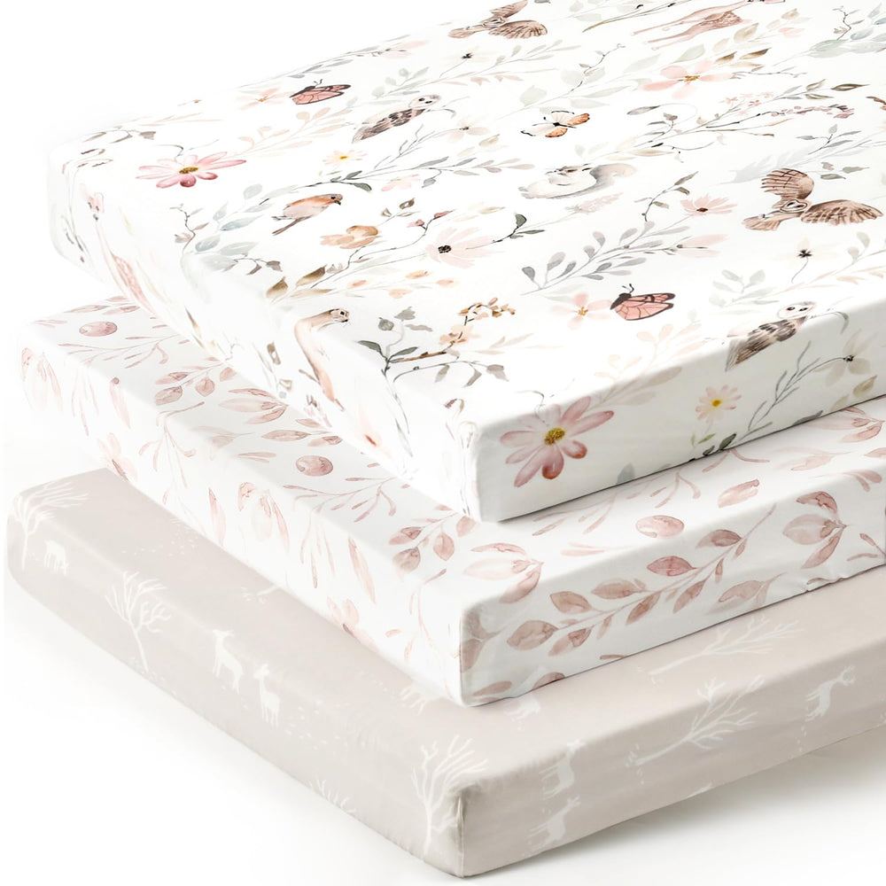GRSSDER stretchy pack n play sheets in blush floral for soft, breathable comfort.