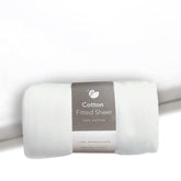 Guava Family travel crib sheet in flat lay highlighting compact travel-ready bedding