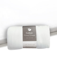 Guava Family travel crib sheet in flat lay highlighting compact travel-ready bedding