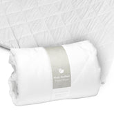 Guava Family travel crib sheet lotus-fit demonstrates a secure Lotus Crib fit with durable stitching.