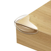 Gudui 8-pack corner guards in clear material protect furniture edges with discreet protection.