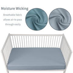 GUNTAIL dark grey crib sheet folded, emphasizing durable, soft fabric.