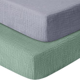 GUNTAIL muslin crib sheets gray-green two-pack neatly folded for breathable baby bedding