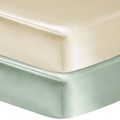 GUNTAIL satin crib sheet pink closeup reduces hair friction for gentle mornings.