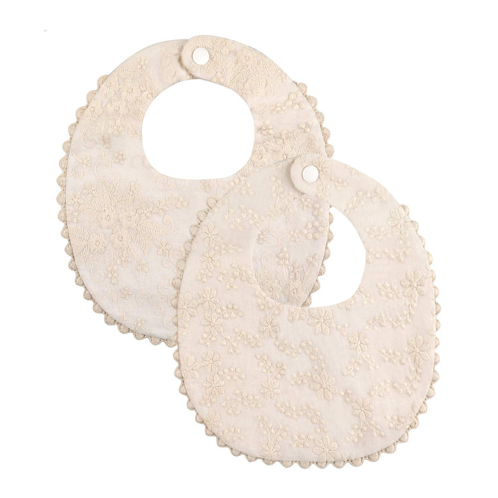GZMM baby bib front view with floral reversible design for stylish drool protection.